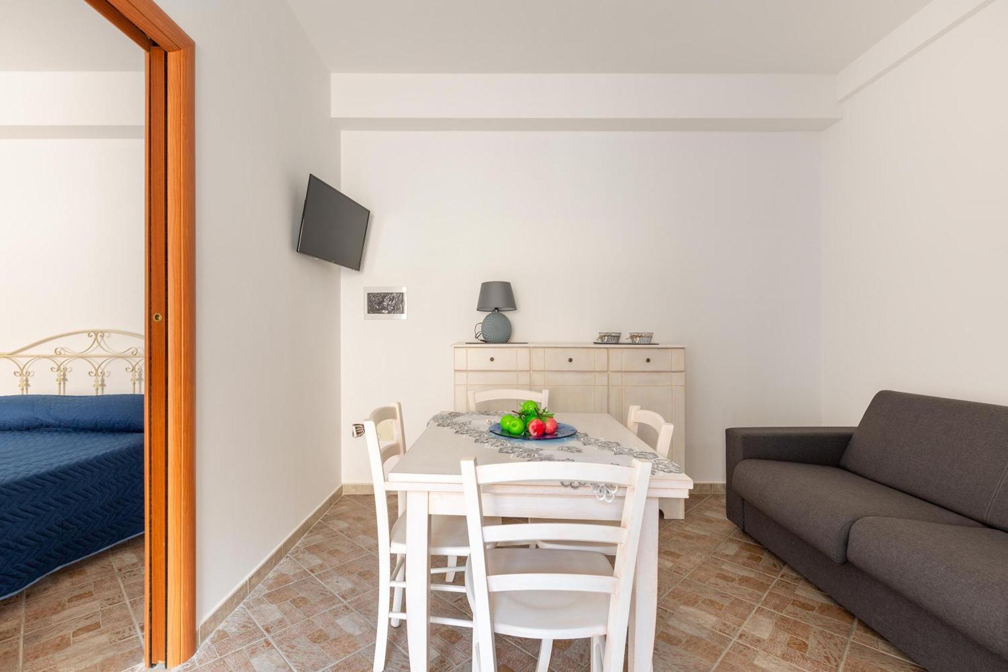 Joy Home Apartments Maruggio Habitación foto